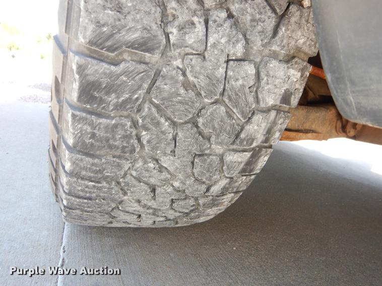 image for item DE1704 2006 Dodge Ram 2500 Quad Cab utility bed pickup truck