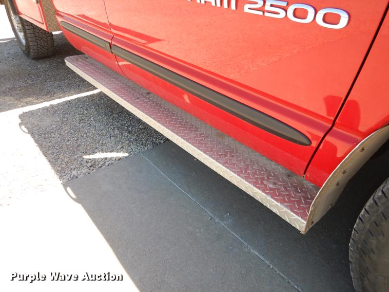 image for item DE1704 2006 Dodge Ram 2500 Quad Cab utility bed pickup truck