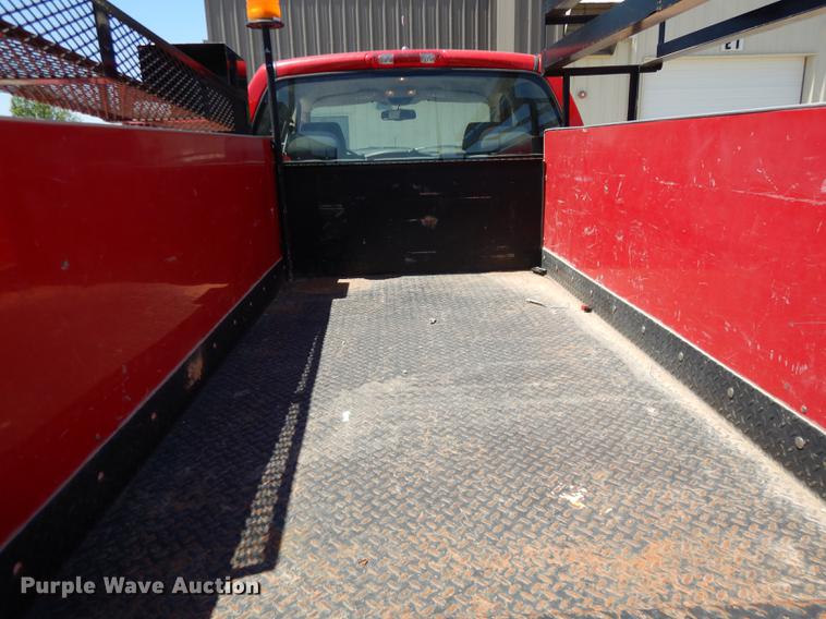 image for item DE1704 2006 Dodge Ram 2500 Quad Cab utility bed pickup truck