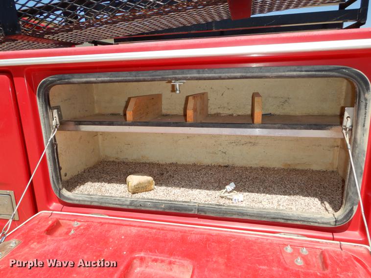 image for item DE1704 2006 Dodge Ram 2500 Quad Cab utility bed pickup truck