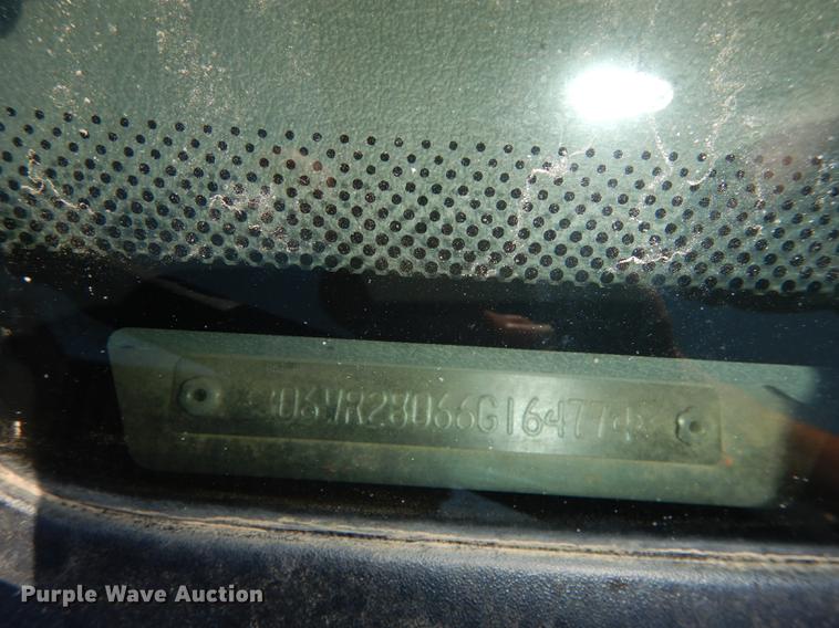 image for item DE1704 2006 Dodge Ram 2500 Quad Cab utility bed pickup truck