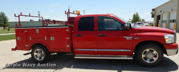 image for item DE1706 2009 Dodge Ram 2500 Quad Cab utility bed pickup truck