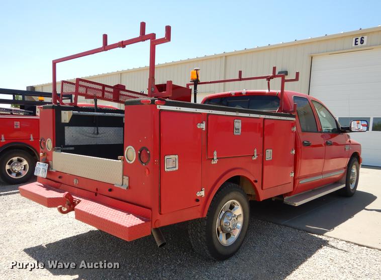 image for item DE1706 2009 Dodge Ram 2500 Quad Cab utility bed pickup truck