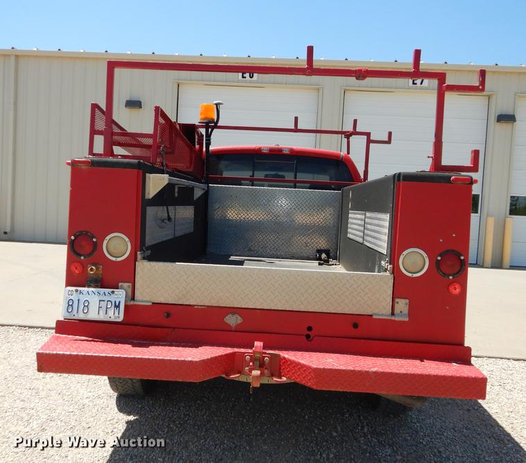 image for item DE1706 2009 Dodge Ram 2500 Quad Cab utility bed pickup truck