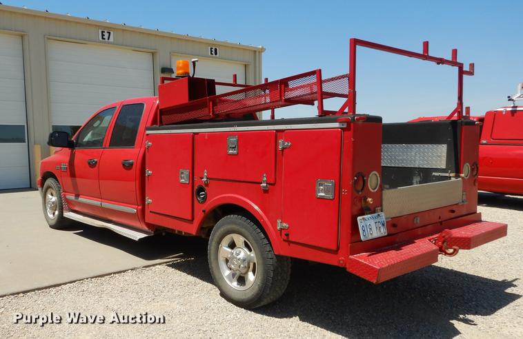 image for item DE1706 2009 Dodge Ram 2500 Quad Cab utility bed pickup truck