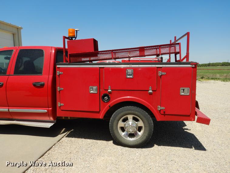 image for item DE1706 2009 Dodge Ram 2500 Quad Cab utility bed pickup truck