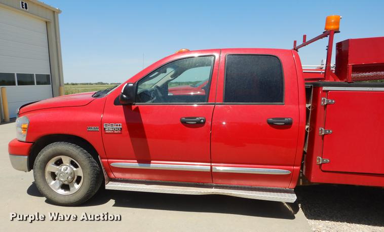 image for item DE1706 2009 Dodge Ram 2500 Quad Cab utility bed pickup truck