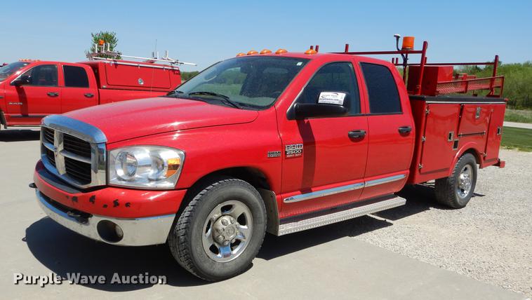 image for item DE1707 2009 Dodge Ram 2500 Quad Cab utility bed pickup truck