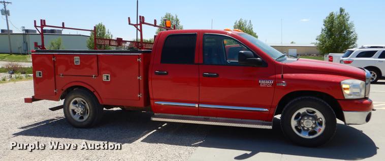 image for item DE1707 2009 Dodge Ram 2500 Quad Cab utility bed pickup truck