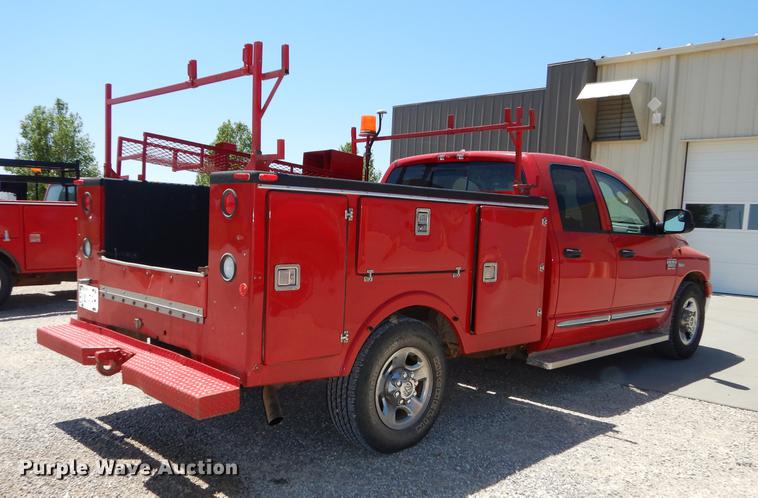 image for item DE1707 2009 Dodge Ram 2500 Quad Cab utility bed pickup truck