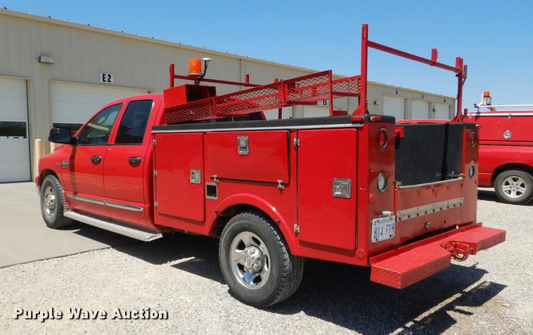 image for item DE1707 2009 Dodge Ram 2500 Quad Cab utility bed pickup truck