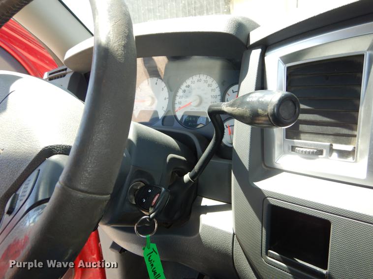 image for item DE1707 2009 Dodge Ram 2500 Quad Cab utility bed pickup truck