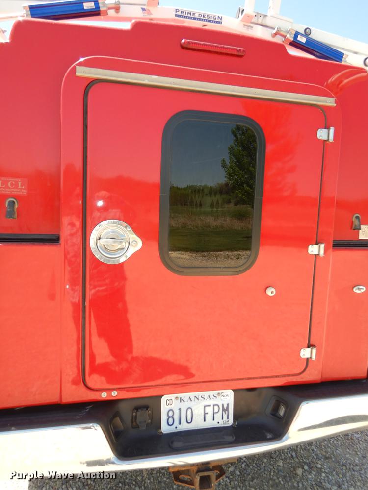 image for item DE1708 2008 Dodge Ram 1500 Quad Cab utility bed pickup truck