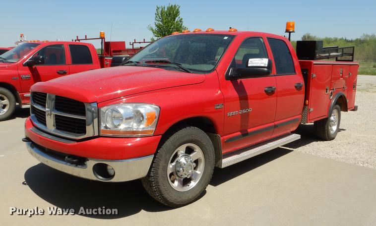 image for item DE1716 2006 Dodge Ram 2500 Quad Cab utility bed pickup truck
