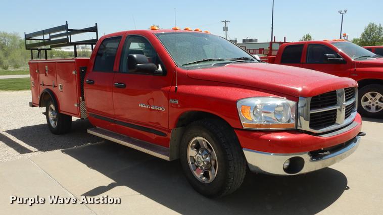 image for item DE1716 2006 Dodge Ram 2500 Quad Cab utility bed pickup truck
