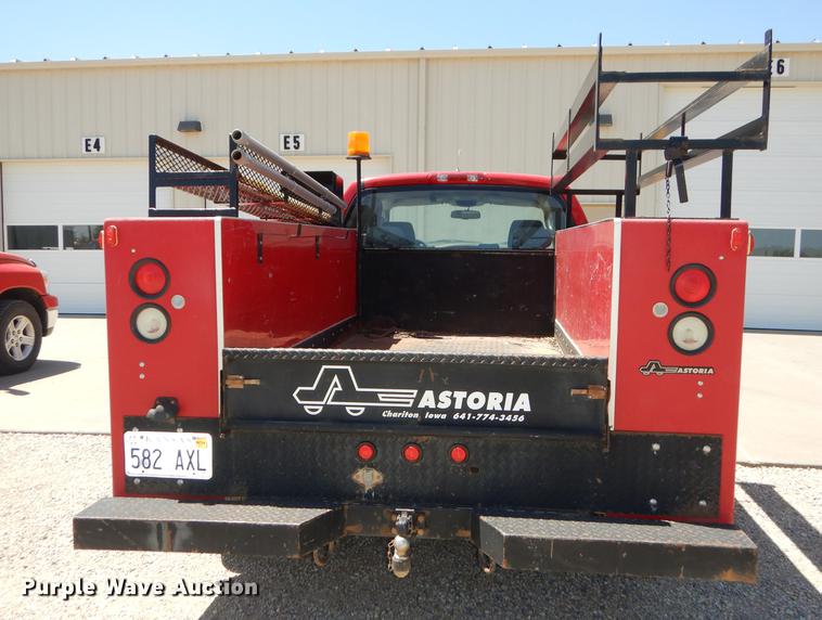 image for item DE1716 2006 Dodge Ram 2500 Quad Cab utility bed pickup truck