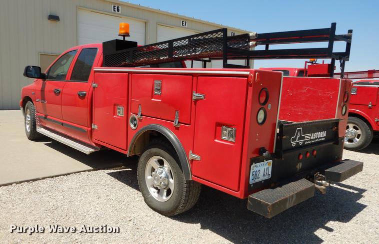 image for item DE1716 2006 Dodge Ram 2500 Quad Cab utility bed pickup truck
