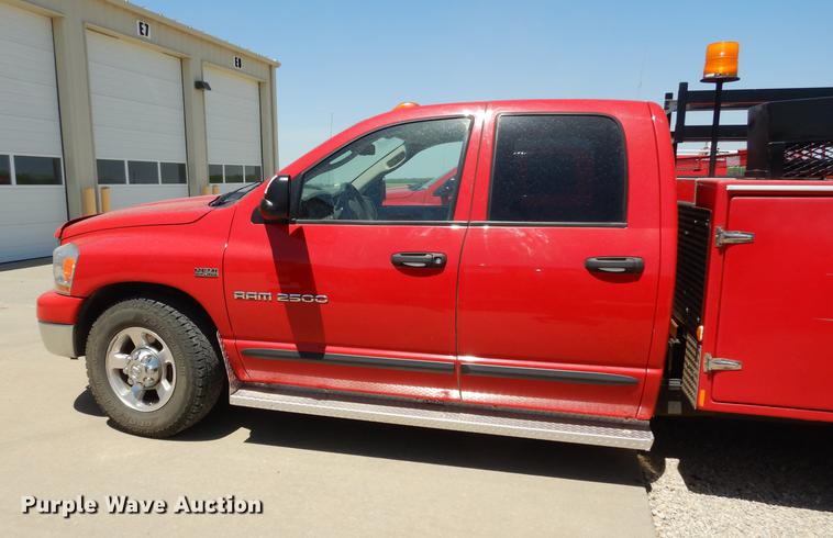 image for item DE1716 2006 Dodge Ram 2500 Quad Cab utility bed pickup truck