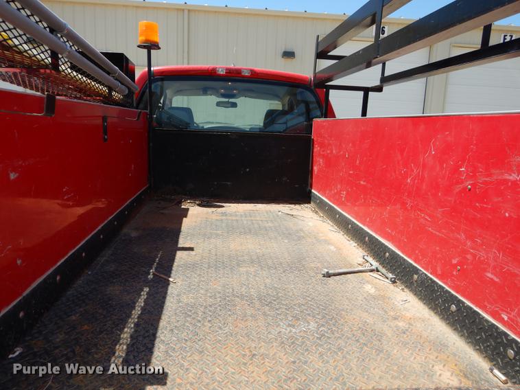 image for item DE1716 2006 Dodge Ram 2500 Quad Cab utility bed pickup truck