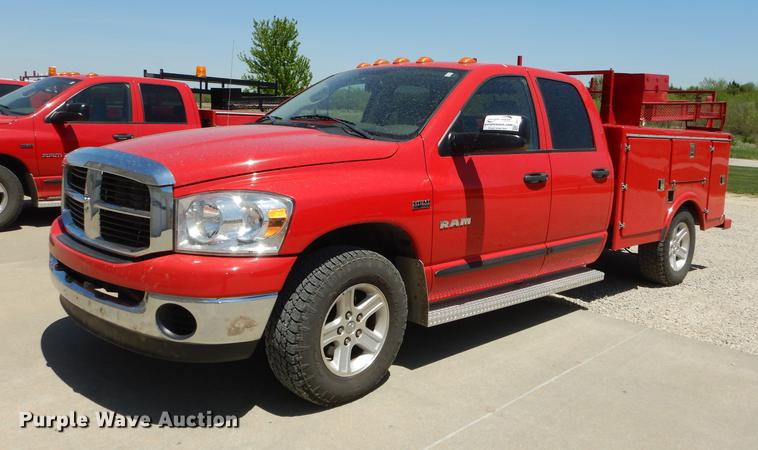 image for item DE1717 2008 Dodge Ram 1500 Quad Cab utility bed pickup truck