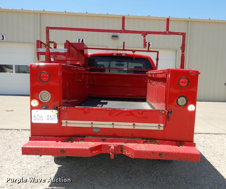 image for item DE1717 2008 Dodge Ram 1500 Quad Cab utility bed pickup truck