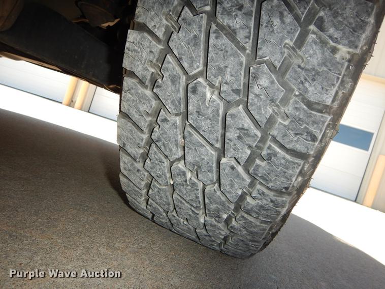 image for item DE1717 2008 Dodge Ram 1500 Quad Cab utility bed pickup truck