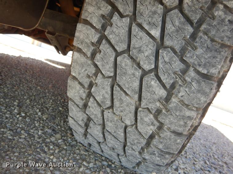 image for item DE1717 2008 Dodge Ram 1500 Quad Cab utility bed pickup truck