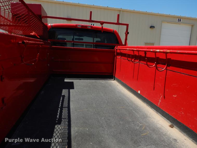 image for item DE1717 2008 Dodge Ram 1500 Quad Cab utility bed pickup truck