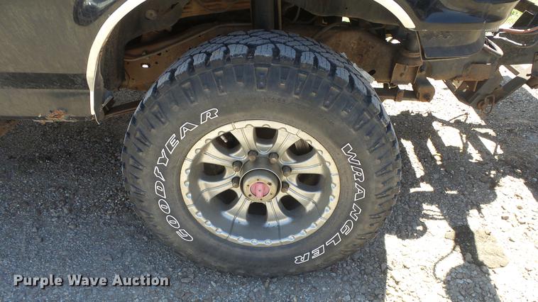 image for item DE2617 1993 Ford F250 flatbed pickup truck