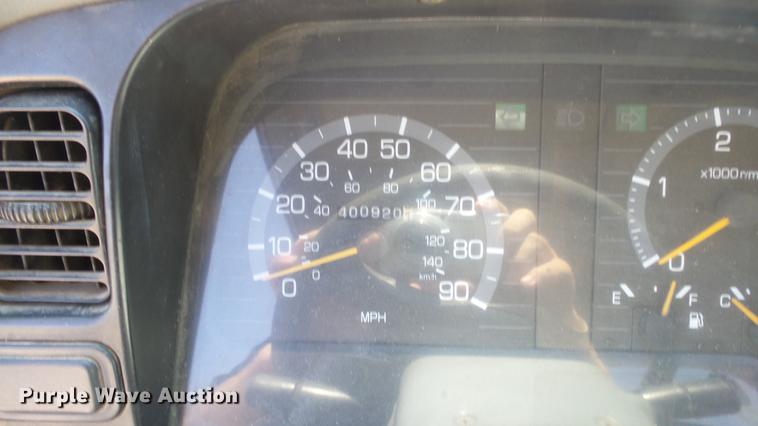 image for item DE2620 1999 Mitsubishi Fuso FH rollback truck