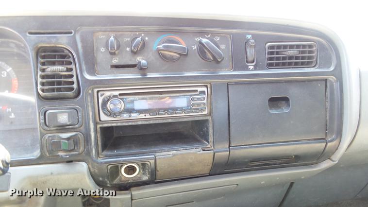 image for item DE2620 1999 Mitsubishi Fuso FH rollback truck