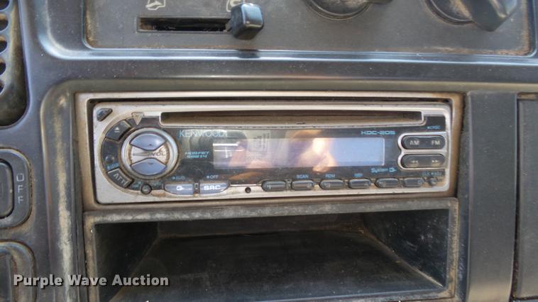 image for item DE2620 1999 Mitsubishi Fuso FH rollback truck