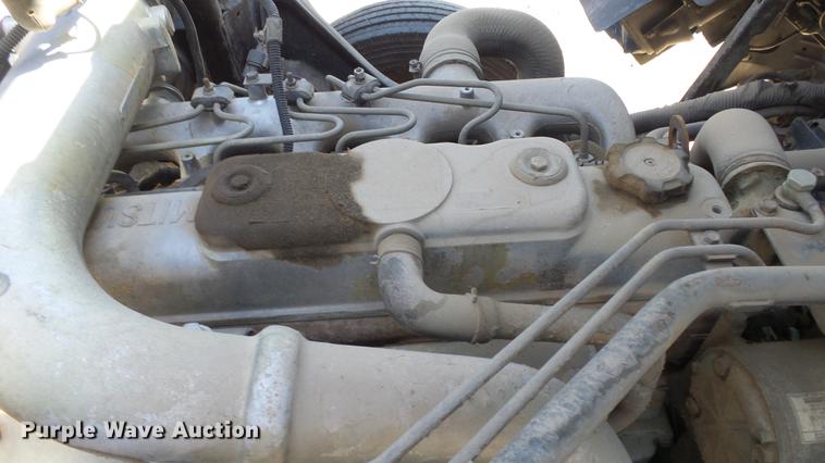image for item DE2620 1999 Mitsubishi Fuso FH rollback truck