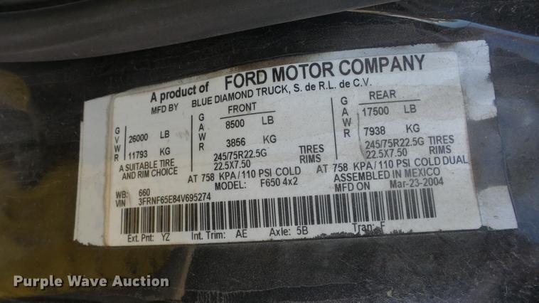image for item DE2627 2004 Ford F650 Super Duty rollback truck