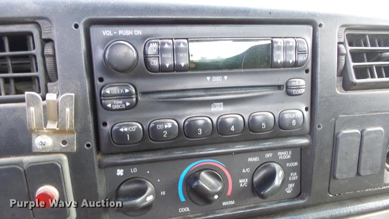 image for item DE2627 2004 Ford F650 Super Duty rollback truck