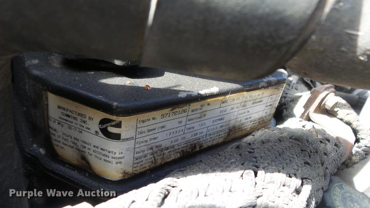 image for item DE2627 2004 Ford F650 Super Duty rollback truck