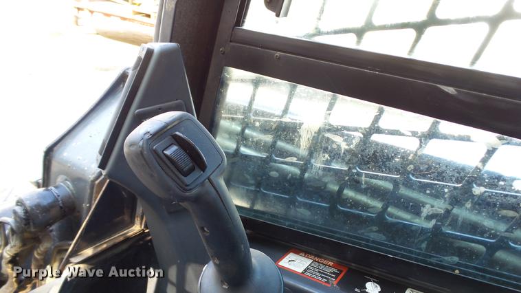 image for item DC4198 2011 John Deere 323D skid steer