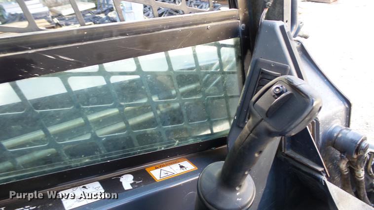 image for item DC4198 2011 John Deere 323D skid steer