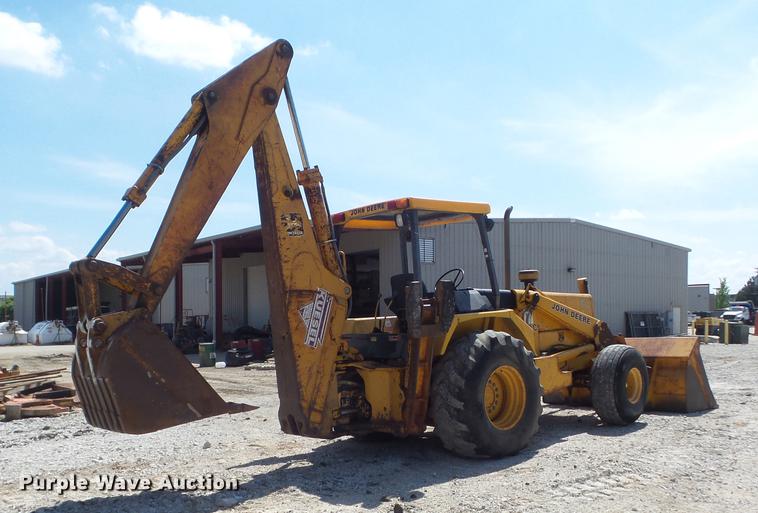 image for item DC7261 1990 John Deere 710C backhoe