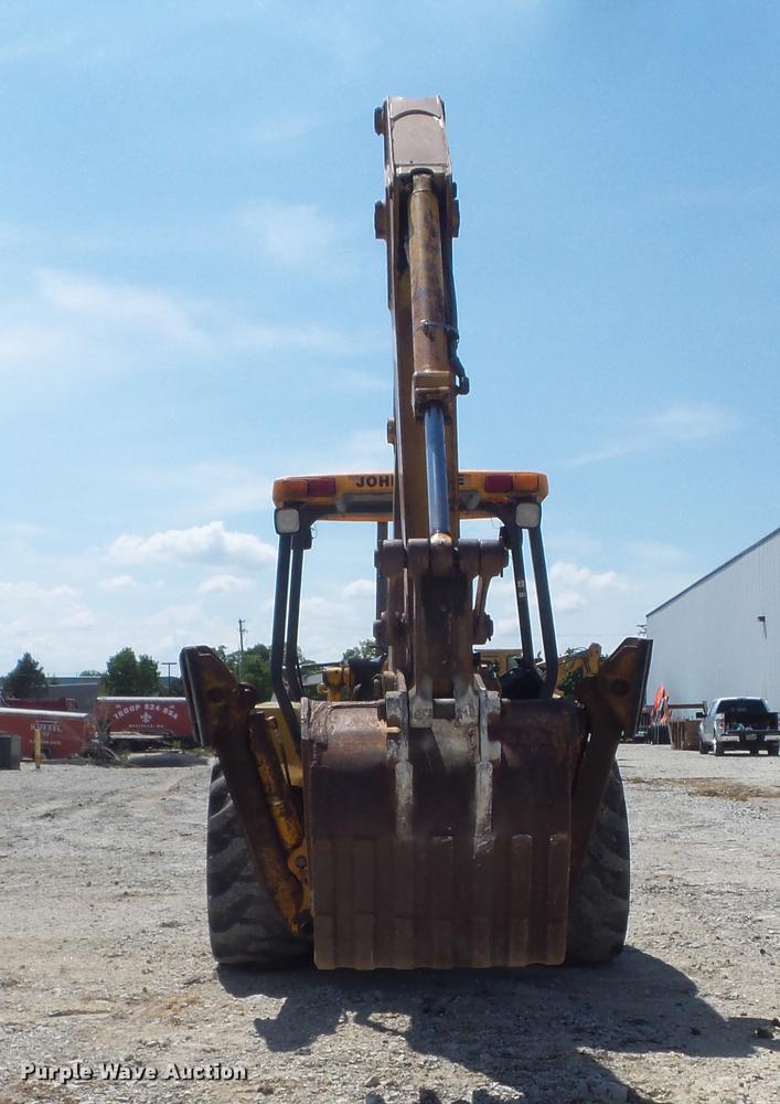 image for item DC7261 1990 John Deere 710C backhoe