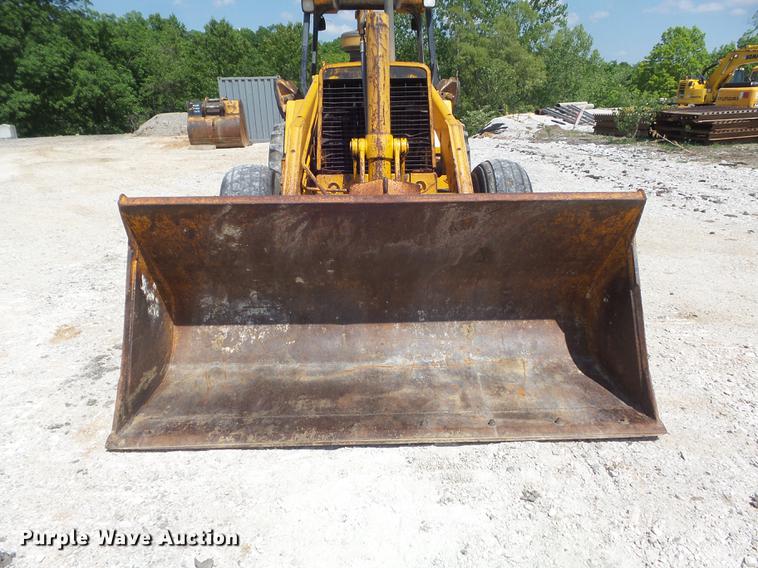 image for item DC7261 1990 John Deere 710C backhoe