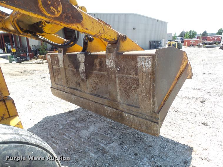 image for item DC7261 1990 John Deere 710C backhoe