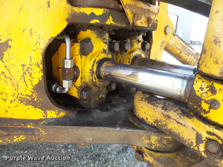 image for item DC7261 1990 John Deere 710C backhoe