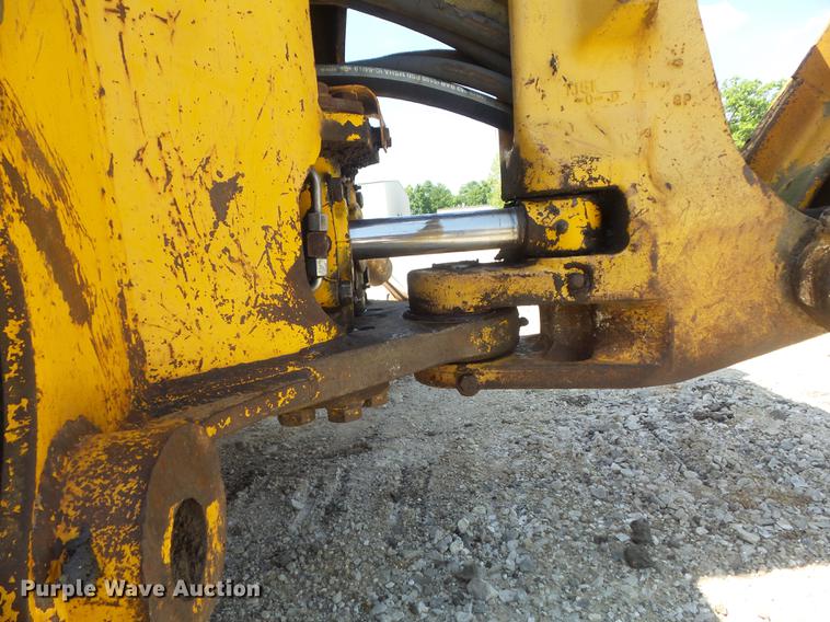 image for item DC7261 1990 John Deere 710C backhoe