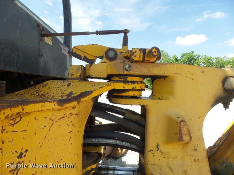 image for item DC7261 1990 John Deere 710C backhoe