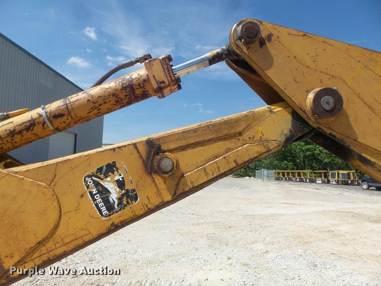 image for item DC7261 1990 John Deere 710C backhoe