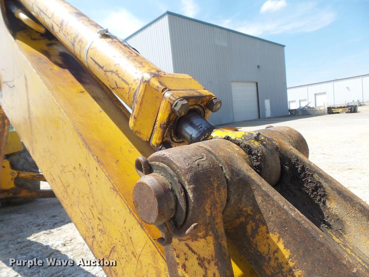 image for item DC7261 1990 John Deere 710C backhoe