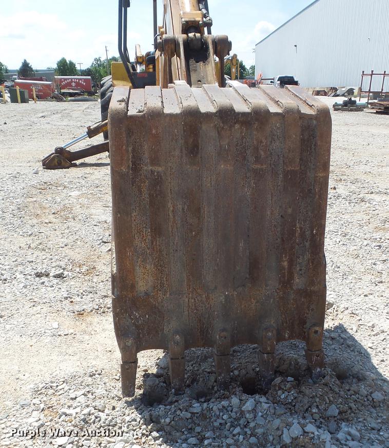 image for item DC7261 1990 John Deere 710C backhoe