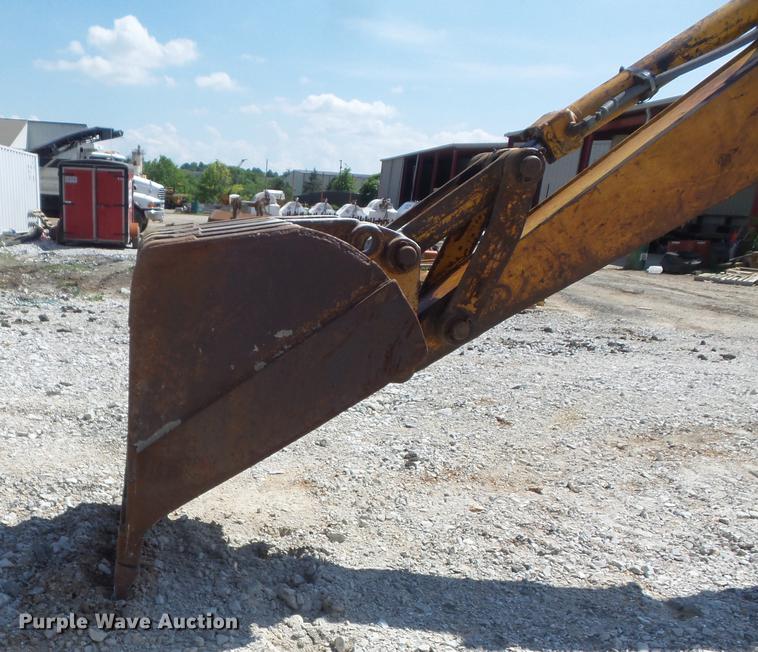 image for item DC7261 1990 John Deere 710C backhoe