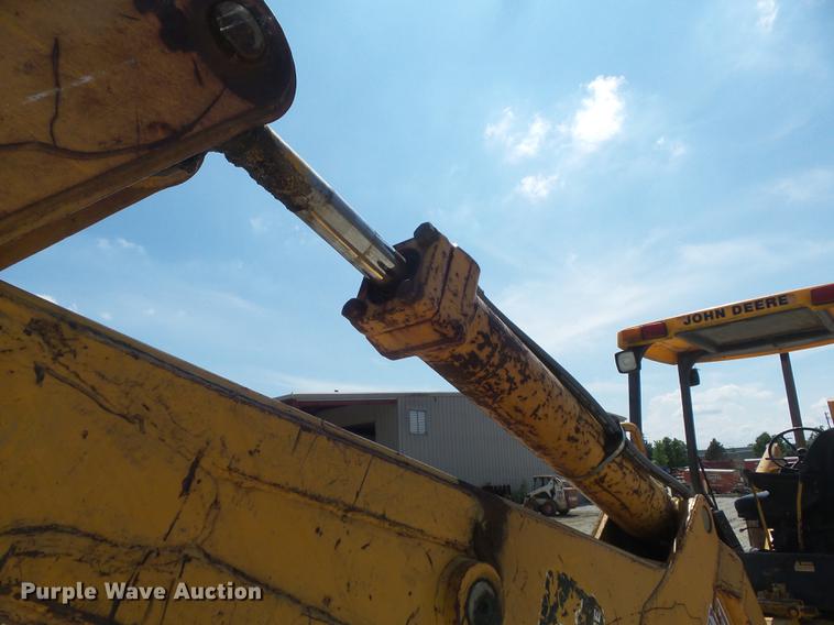 image for item DC7261 1990 John Deere 710C backhoe